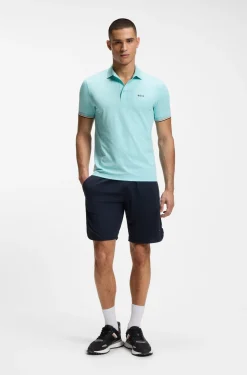 Active Slim-Fit Poloshirt mit geprägtem Tennisball-Muster