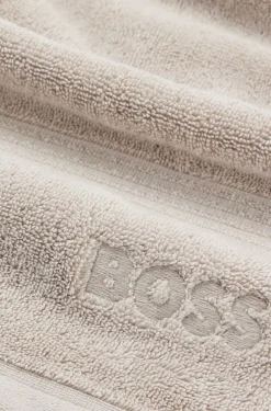 Beiges Badetuch aus ägäischer Baumwolle mit tonalem Logo