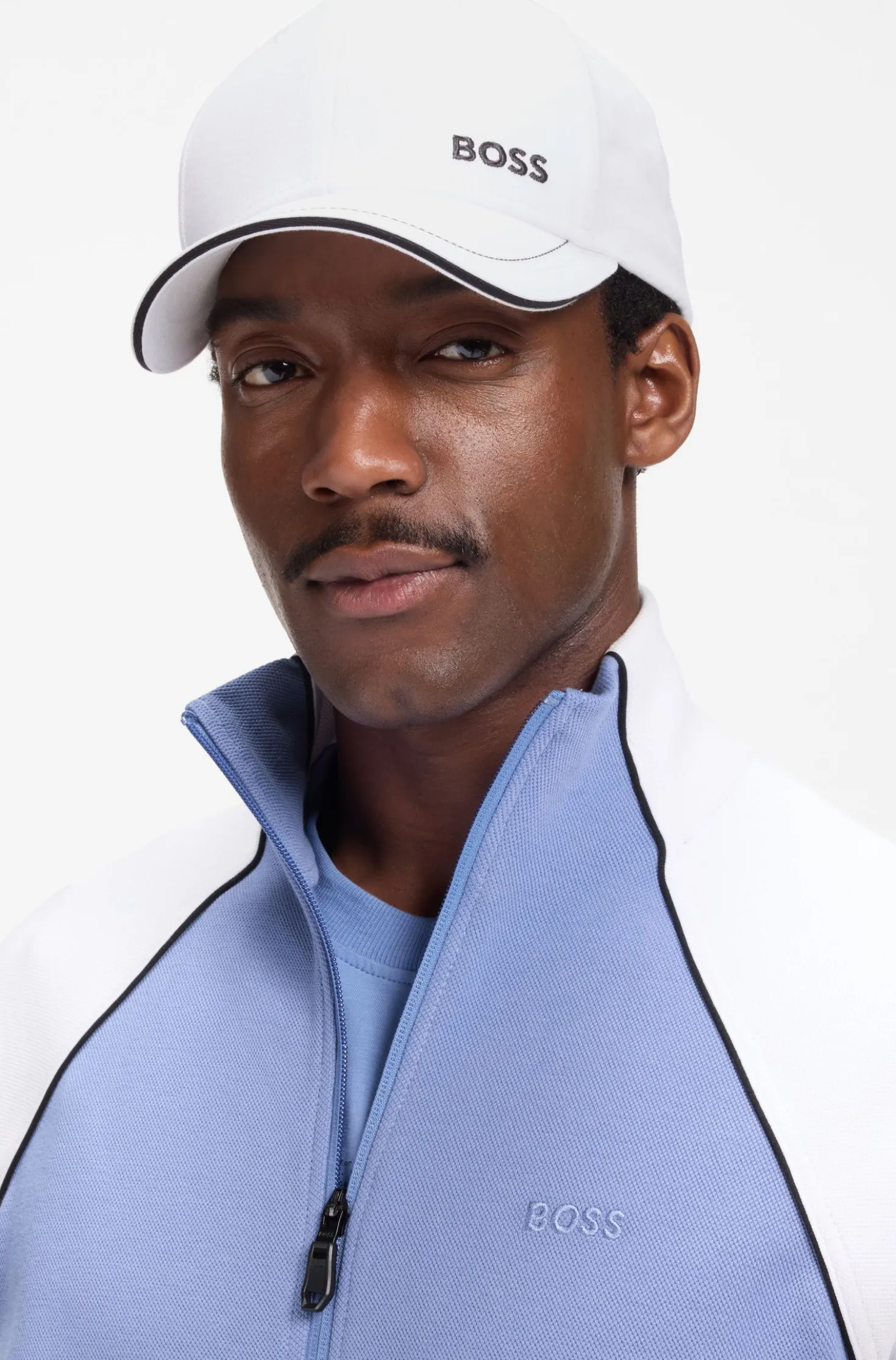 Cap aus Baumwoll-Twill mit Kontrast-Details und Logo-Stickerei