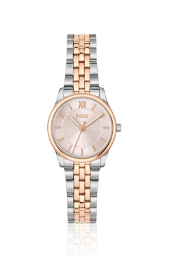 Elegante zweifarbige Uhr mit rosafarbenem Zifferblatt im Sonnenschliff