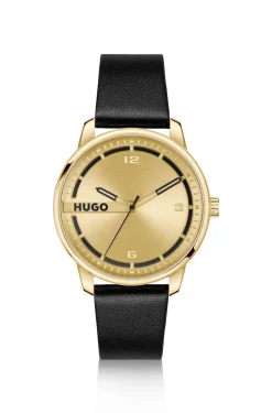 Goldfarbene Uhr mit schwarzem Lederarmband