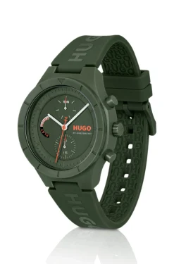 Grüne Uhr mit Logos auf dem Silikonarmband