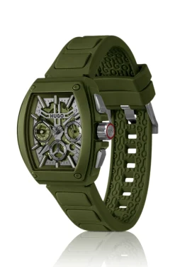 Grüne Uhr mit skelettiertem Zifferblatt und Silikonarmband