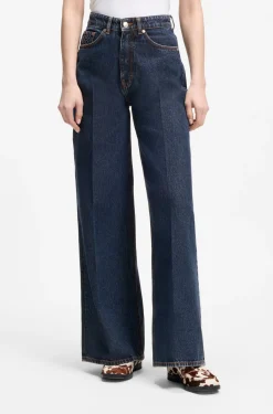 Jeans aus blauem Denim mit weitem Beinverlauf und Bundfalten auf der Vorderseite