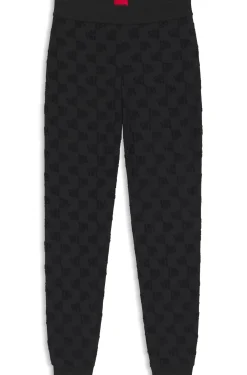 Jogginghose aus Baumwoll-Mix mit Allover-Logo-Muster