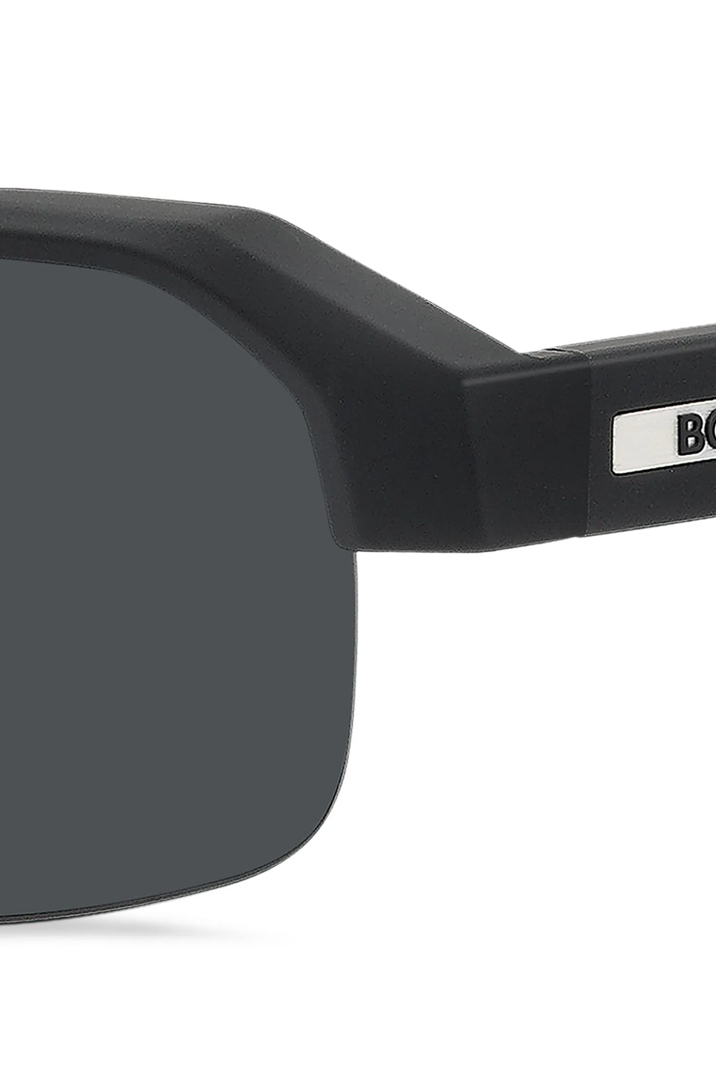 Schwarze Sonnenbrille mit Einsatz am Bügel und Logo