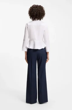 Slim-Fit Bluse aus Baumwolle mit Schößchensaum