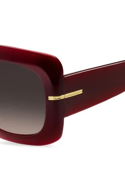Sonnenbrille aus burgunderrotem Acetat mit goldfarbenen Scharnieren
