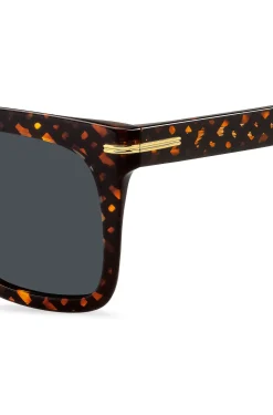 Sonnenbrille mit goldfarbenen Metalldetails und Monogramm-Muster