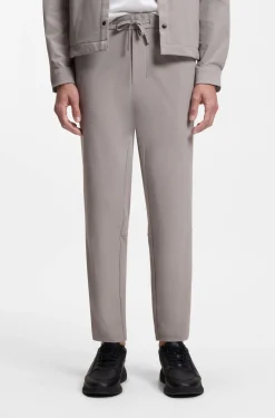 Tapered-Fit Hose aus Stretch-Gewebe mit Waffelstruktur
