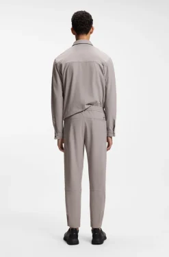 Tapered-Fit Hose aus Stretch-Gewebe mit Waffelstruktur