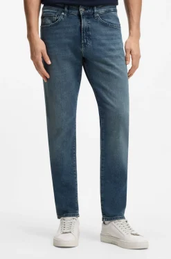 Tapered-Fit Jeans aus verwaschenem blauem Stretch-Denim