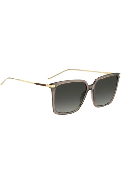Transparent-braune Sonnenbrille mit goldfarbenen Details