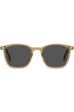 Transparente, beigefarbene Sonnenbrille mit grauen Gläsern
